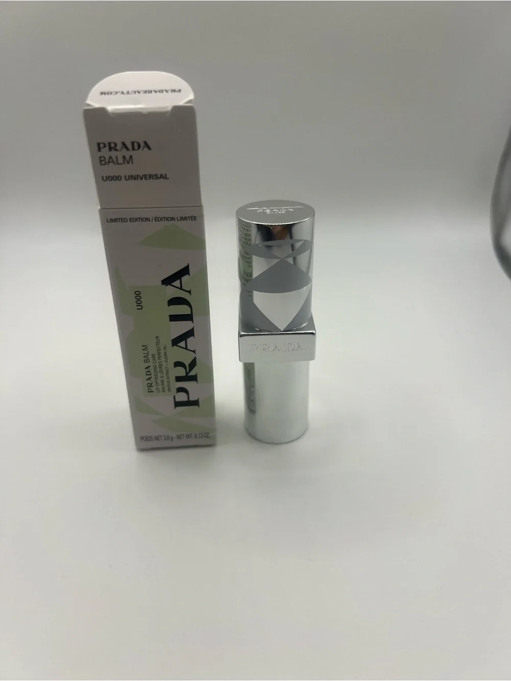Prada Lip Balm U000 Universal in Pale Green with Silver Case
